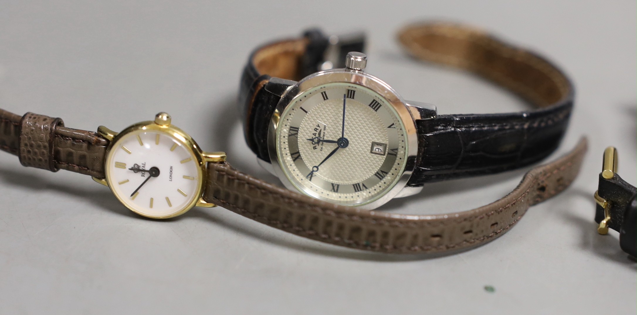 Six various lady's wrist watches, with quartz and other movements, including Sekonda and Rotary and a pair of simulated pearl earrings.